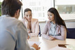 Business executive discussing with his clients