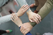 Close-up of connecting hands of business executives