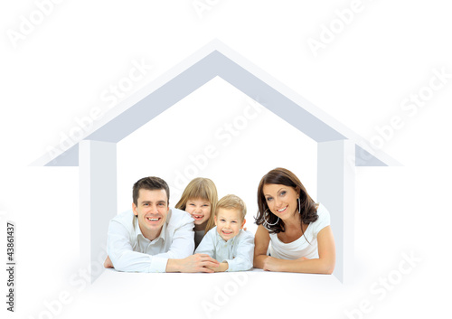 Photo: Happy family in a house. Isolated over a white backgroun Happy family in a house. Isolated over a white backgroun