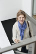 Woman moving up stairs