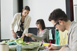 Fashion designers working in an office