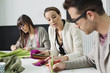 Fashion designers working in an office