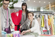 Fashion designers working in an office