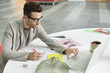 Male fashion designer working in an office