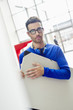 Design professional carrying a drawing board