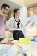Fashion designers working in an office