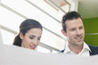Couple reading a blueprint