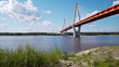 View on a ship sailing under the highway bridge