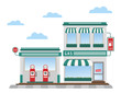 green gas station pumps and shop