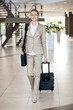 young businesswoman traveller walking at airport