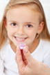 Girl receiving homeopathic medication