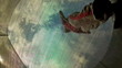 Woman jumping on a trampoline, a bottom view