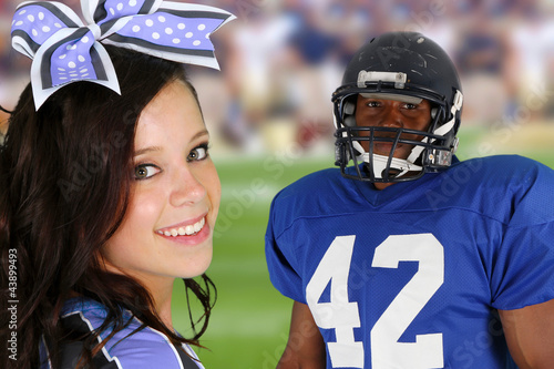 Photo: Cheerleader and Player Cheerleader and Player