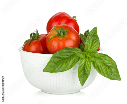 Photo: Ripe tomatoes and basil Ripe tomatoes and basil