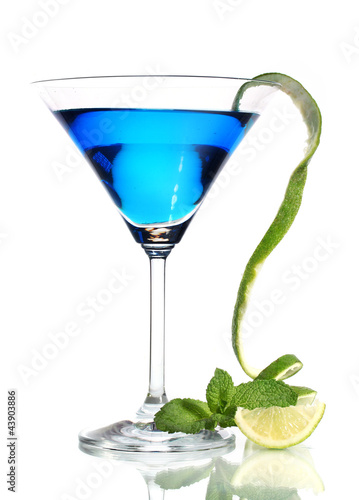 Photo: Blue cocktail in martini glass isolated on white Blue cocktail in martini glass isolated on white