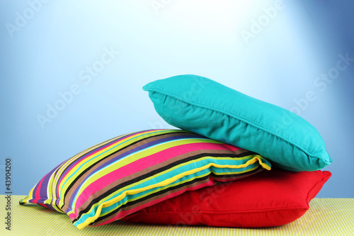 Photo: pillows on blue background pillows on blue background