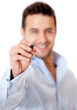 Business man holding a pen