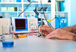 An engineer tests electronic components