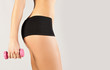 Photo: Nice sporty women body. Holding dumbbell Nice sporty women body. Holding dumbbell