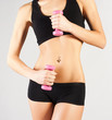 Photo: Nice sporty women body. Holding dumbbell Nice sporty women body. Holding dumbbell
