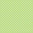 Seamless vector pattern with polka dots on green background