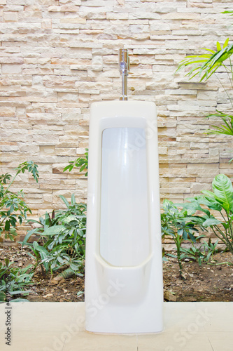 Photo: A mens public toilet with urinary A mens public toilet with urinary