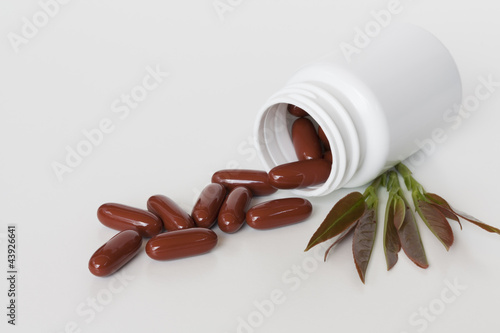 Photo: Pills wtih bottle Pills wtih bottle