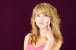Young blond girl wondering