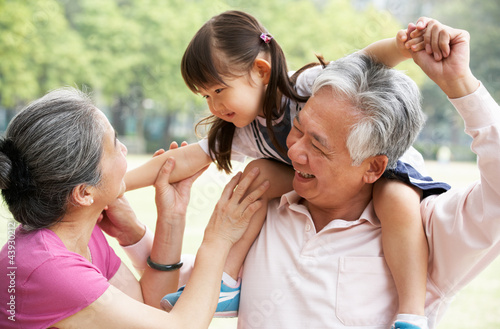 Photo: Chinese Grandparents Giving Granddaughter Ride On Shoulders Chinese Grandparents Giving Granddaughter Ride On Shoulders