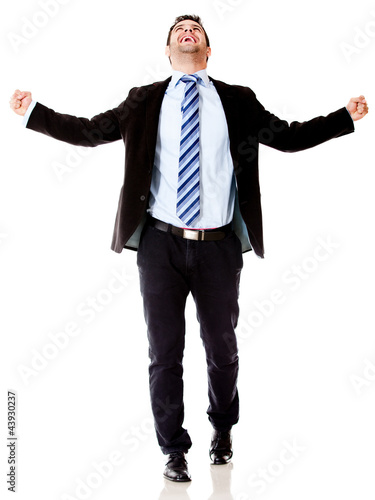 Photo: Successful business man celebrating Successful business man celebrating