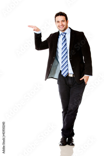 Photo: Businessman with hand on something Businessman with hand on something