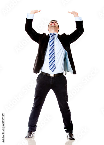 Photo: Business man lifting something Business man lifting something