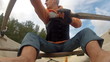 Man in a Life Jacket in a Boat Rowing Oars, closeup
