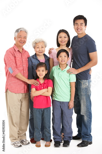Photo: Full Length Studio Shot Of Multi-Generation Chinese Family Full Length Studio Shot Of Multi-Generation Chinese Family