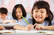 Photo: Group Of Students Working At Desks In Chinese School Classroom Group Of Students Working At Desks In Chinese School Classroom