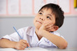 Male Student Working At Desk I...