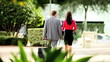 Businesswoman Walking with Traveling Colleague