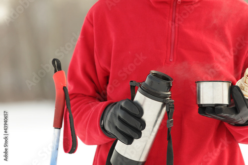 Photo: Skier with thermos Skier with thermos