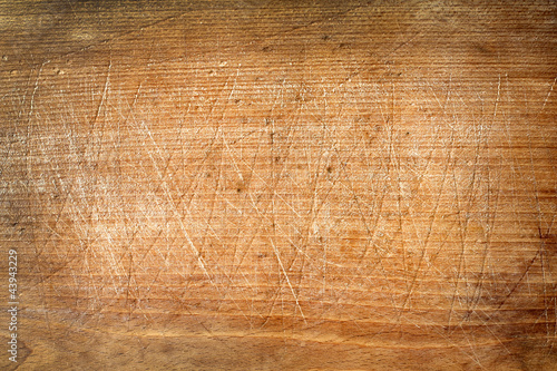 Photo: Old grunge wooden cutting kitchen desk board Old grunge wooden cutting kitchen desk board
