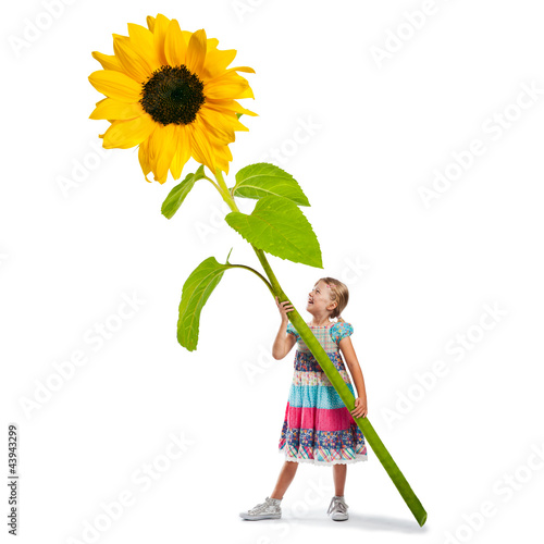 Foto: Muttertag - Mädchen mit großer Sonnenblume Muttertag - Mädchen mit großer Sonnenblume