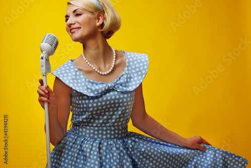 Photo: Woman singer in blue dress Woman singer in blue dress