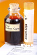 Allium Cepa plant extract, homeopathic pills on sheet