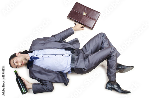 Foto: Drunk businessman on the floor Drunk businessman on the floor