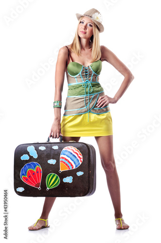 Foto: Woman preparing for beach vacation Woman preparing for beach vacation