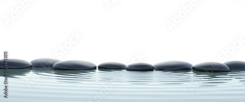 Photo: Zen stones in water on widescreen Zen stones in water on widescreen