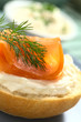 Smoked salmon and cream cheese canape with dill