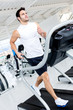 Gym man on the treadmill