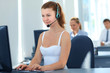 Photo: Female customer support operator with headset and smiling Female customer support operator with headset and smiling
