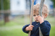 One year boy playing in the park portrait.