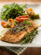 grilled salmon with capsicum and arugula, selective focus
